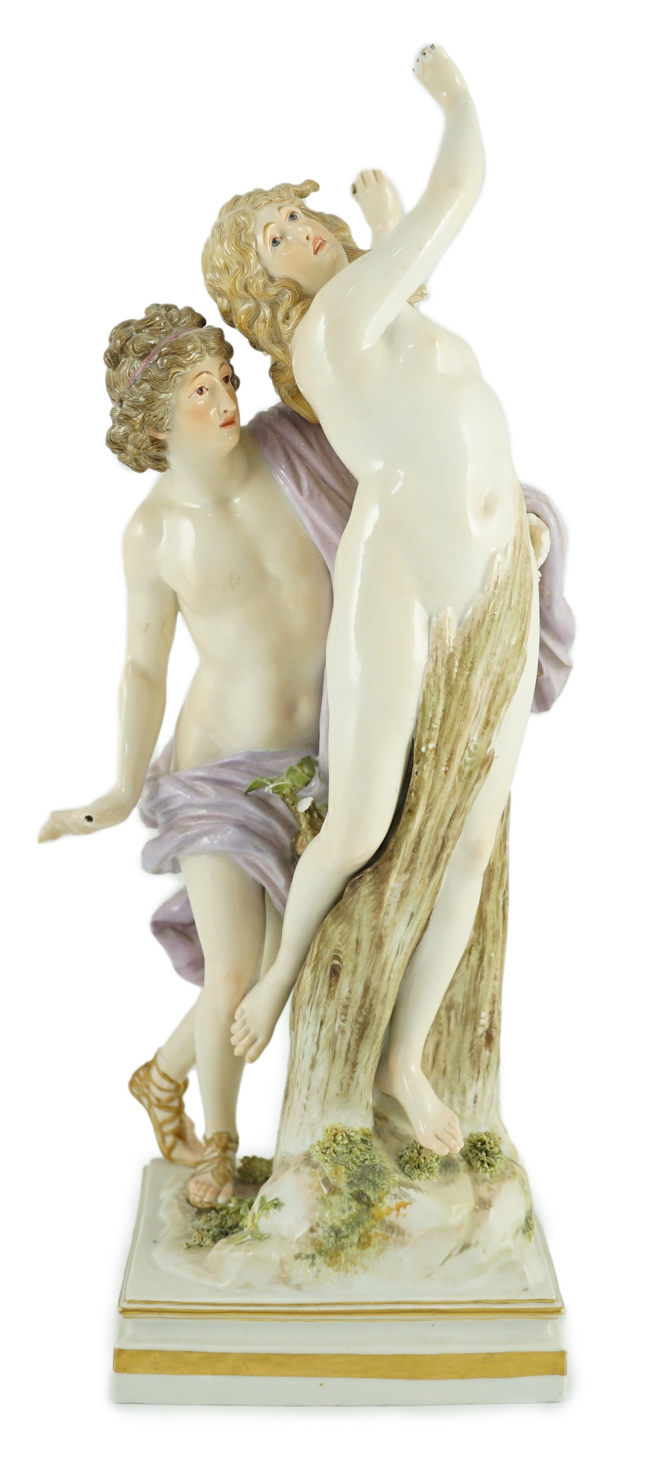 A Meissen allegorical group of Apollo and Daphne, 19th century, 36cm high, losses to hands and hair